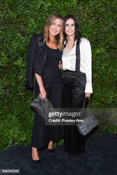 Jennifer Aniston and Courtney Cox attend CHANEL Dinner Celebrating Our Majestic Oceans, A Benefit For NRDC on June 2, 2018 in Malibu, California.
