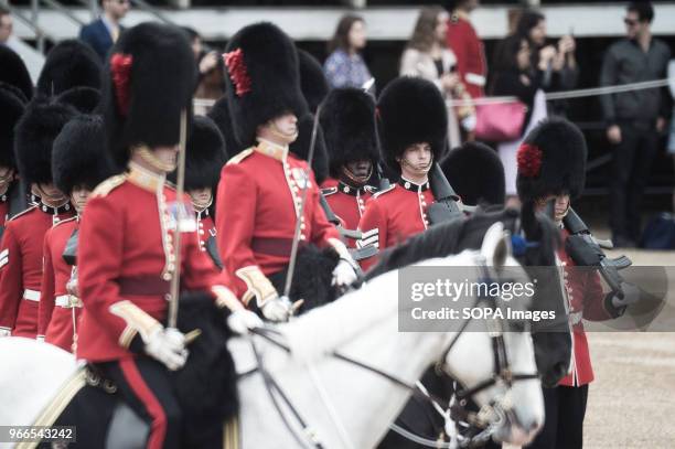 Members of the Royal Guard and horses are seen during the Colonel's Review. Soldiers rehearse their steps as they prepare for Trooping the Color to...