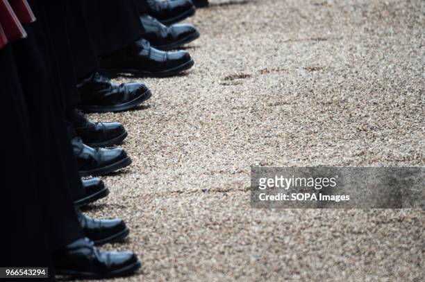 Boots of members of the Royal Guard are seen during the Colonel's review. Soldiers rehearse their steps as they prepare for Trooping the Color to...