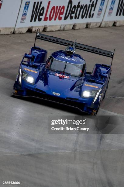 The Cadillac DPi of Tristan Vautier, of France, and Matt McMurray races on the track during the IMSA WeatherTech Series race at the Chevrolet Detroit...