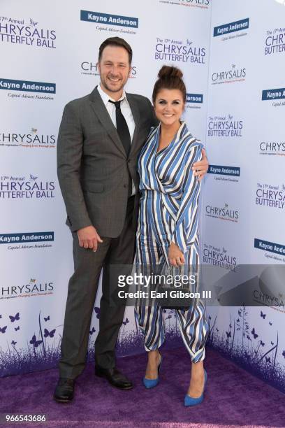 Brady Smith and Tiffani Thiessen attend the 17th Annual Chrysalis Butterfly Ball at Private Residence on June 2, 2018 in Brentwood, California.