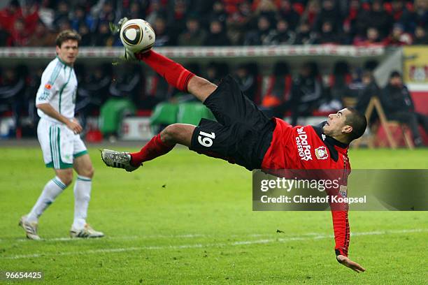 Eren Derdiyok of Leverkusen does an overhead kick during the Bundesliga match between Bayer Leverkusen and VfL Wolfsburg at the BayArena on February...