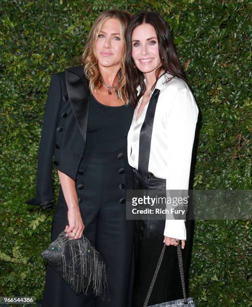 Jennifer Aniston and Courtney Cox attend the CHANEL Dinner Celebrating Our Majestic Oceans, A Benefit For NRDC on June 2, 2018 in Malibu, California.