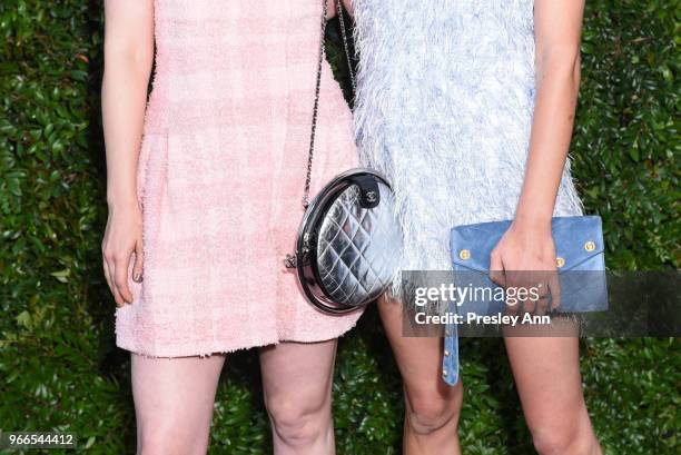 Bella Heathcote and Phoebe Tonkin attend CHANEL Dinner Celebrating Our Majestic Oceans, A Benefit For NRDC on June 2, 2018 in Malibu, California.