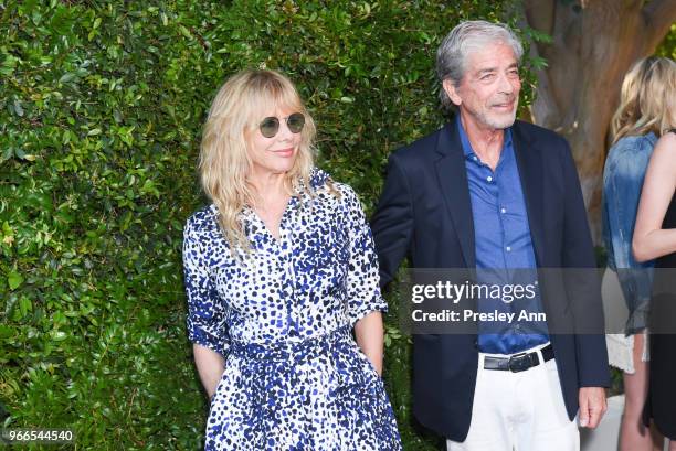 Rosanna Arquette and Todd Morgan attend CHANEL Dinner Celebrating Our Majestic Oceans, A Benefit For NRDC on June 2, 2018 in Malibu, California.