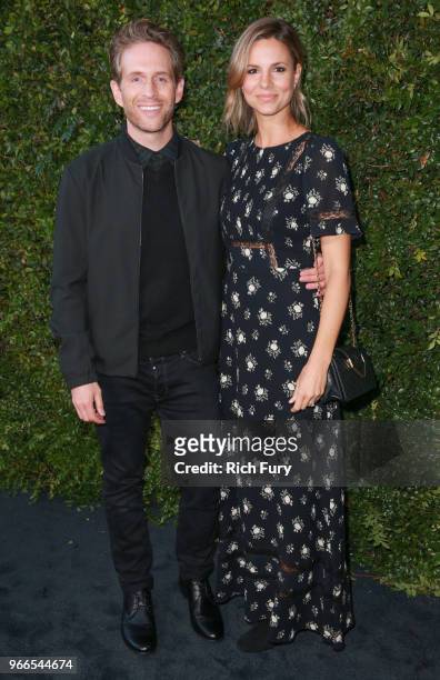 Glenn Howerton and Jill Latiano attend the CHANEL Dinner Celebrating Our Majestic Oceans, A Benefit For NRDC on June 2, 2018 in Malibu, California.