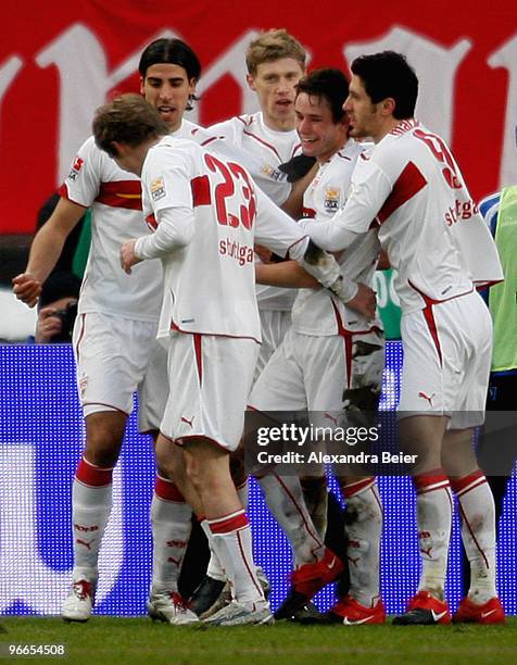 Players of VfB Stuttgart celebrate their first goal during the Bundesliga first division soccer match between VfB Stuttgart and Hamburger SV at...