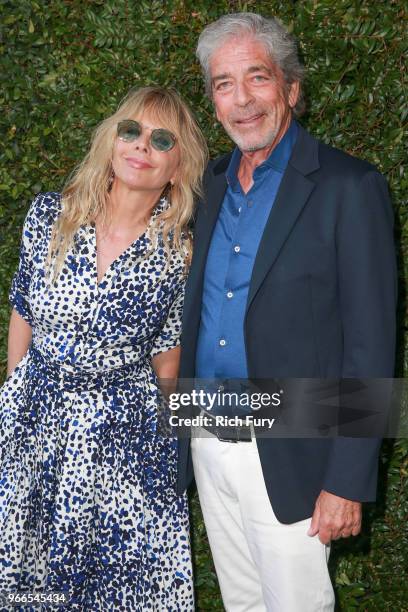 Rosanna Arquette and Todd Morgan attend the CHANEL Dinner Celebrating Our Majestic Oceans, A Benefit For NRDC on June 2, 2018 in Malibu, California.