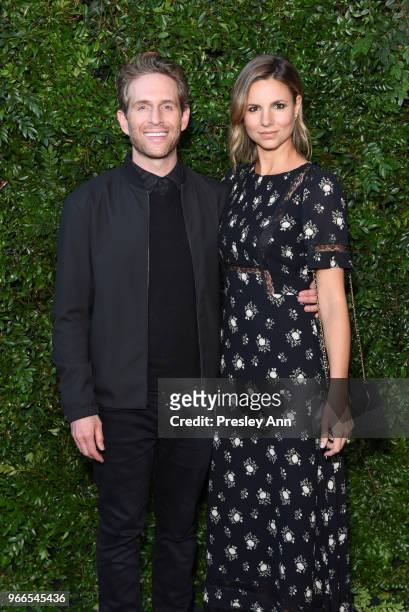 Glenn Howerton and Jill Latiano attend CHANEL Dinner Celebrating Our Majestic Oceans, A Benefit For NRDC on June 2, 2018 in Malibu, California.