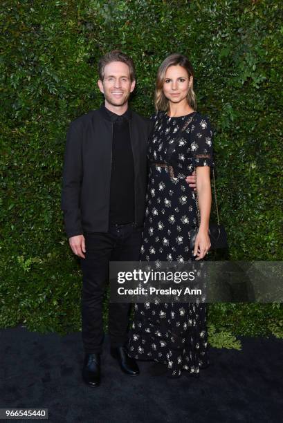 Glenn Howerton and Jill Latiano attend CHANEL Dinner Celebrating Our Majestic Oceans, A Benefit For NRDC on June 2, 2018 in Malibu, California.