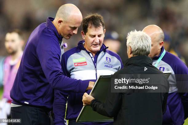 Dockers head coach Ross Lyon with assistant David Hale during the round 11 AFL match between the Collingwood Magpies and the Fremantle Dockers at...