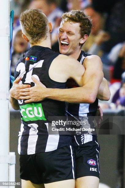 Will Hoskin-Elliott of the Magpies celebrates a goal during the round 11 AFL match between the Collingwood Magpies and the Fremantle Dockers at...