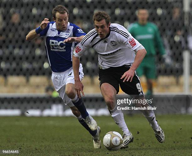 Rob Hulse of Derby contests with Lee Bowyer of Birmingham during the FA Cup sponsored by E.ON 5th Round match between Derby County and Birmingham...