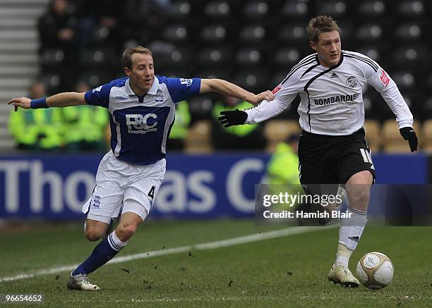 Kris Commons of Derby contests with Lee Bowyer of Birmingham during the FA Cup sponsored by E.ON 5th Round match between Derby County and Birmingham...