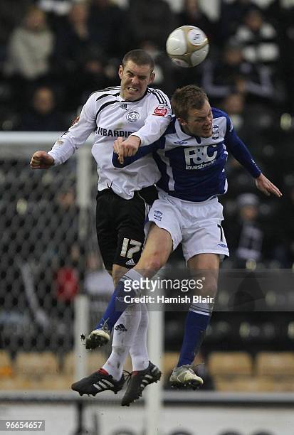 Jake Buxton of Derby contests with Sebastian Larsson of Birmingham during the FA Cup sponsored by E.ON 5th Round match between Derby County and...