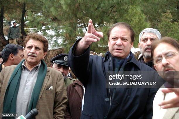 Pakistani opposition leader Nawaz Sharif and Azad Kashmir state prime minister Farooq Haider visit Chakar village, some 40 km from...