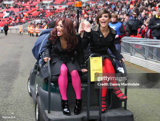 Vanessa White and Frankie Sandford of The Saturdays are seen on a buggy ahead of the Saracens vs Worcester Guinness Premiership rugby match at...