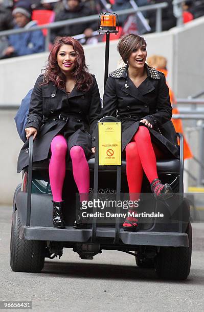 Vanessa White and Frankie Sandford of The Saturdays are seen on a buggy ahead of the Saracens vs Worcester Guinness Premiership rugby match at...