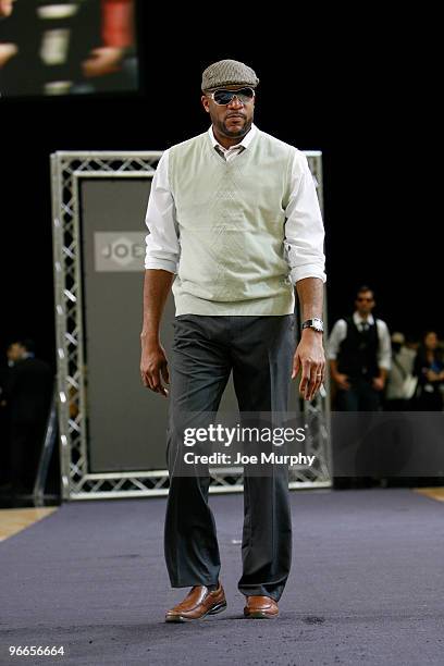 Former NBA player Bruce Bowen models during the Joe Joseph Abboud All-Star Fashion Show presented by JCPenney on center court at Jam Session...