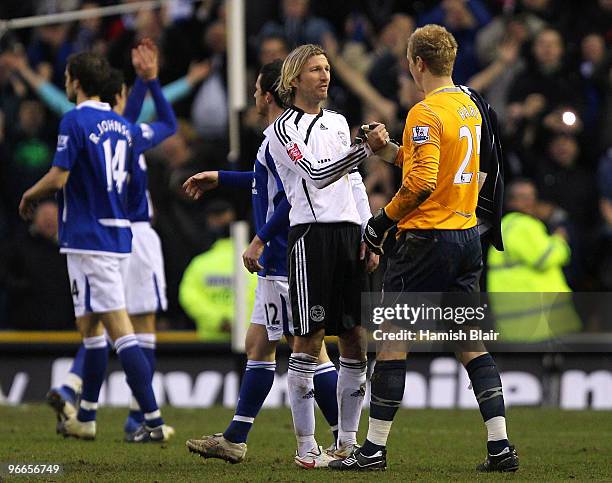 Joe Hart of Birmingham shakes hands with Robbie Savage of Derby after the FA Cup sponsored by E.ON 5th Round match between Derby County and...