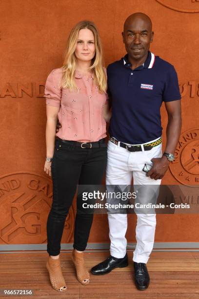 Aurelie Nollet et Lucien Jean-Baptiste attends the 2018 French Open - Day Seven at Roland Garros on June 2, 2018 in Paris, France.