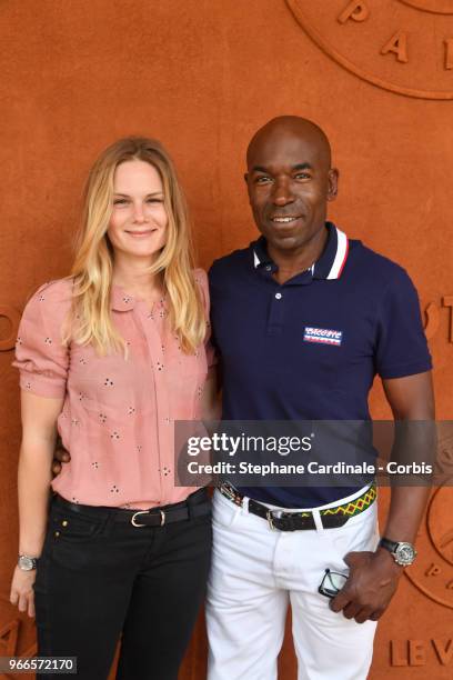Aurelie Nollet et Lucien Jean-Baptiste attends the 2018 French Open - Day Seven at Roland Garros on June 2, 2018 in Paris, France.