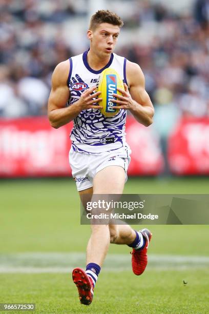 Darcy Tucker of the Dockers marks the ball during the round 11 AFL match between the Collingwood Magpies and the Fremantle Dockers at Melbourne...