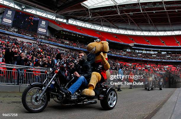 Saracens mascot rides on a motorbike prior to the Guinness Premiership match between Saracens and Worcester Warriors at Wembley Stadium on February...