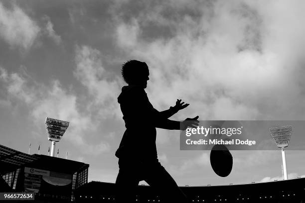 Jaidyn Stephenson of the Magpies kicks the ball during the round 11 AFL match between the Collingwood Magpies and the Fremantle Dockers at Melbourne...