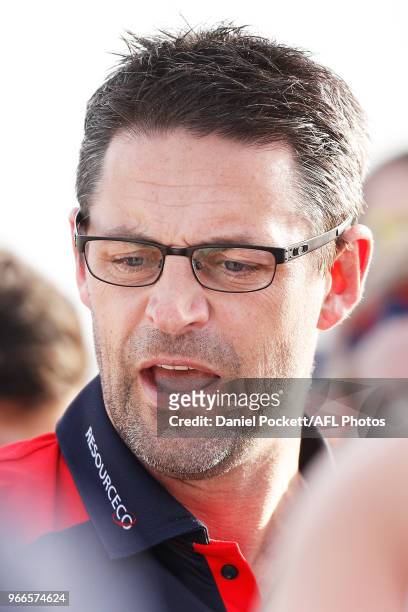 Scorpions head coach Jade Rawlings talks to his players at quarter time during the round nine VFL match between Williamstown and Casey at...