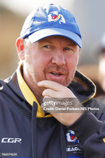 Williamstown head coach Andy Collins talks to his players at quarter time during the round nine VFL match between Williamstown and Casey at...