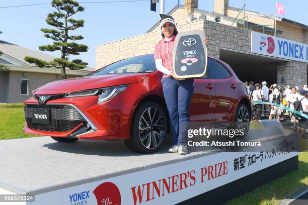 Shiho Oyama of Japan poses with the prize car after winning the Yonex Ladies at Yonex Country Club on June 3, 2018 in Nagaoka, Niigata, Japan.