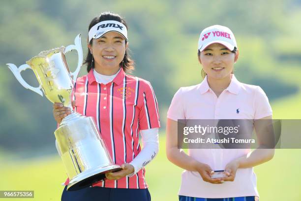 Shiho Oyama and Rio Ishii of Japan pose with trophy after winning the Yonex Ladies at Yonex Country Club on June 3, 2018 in Nagaoka, Niigata, Japan.