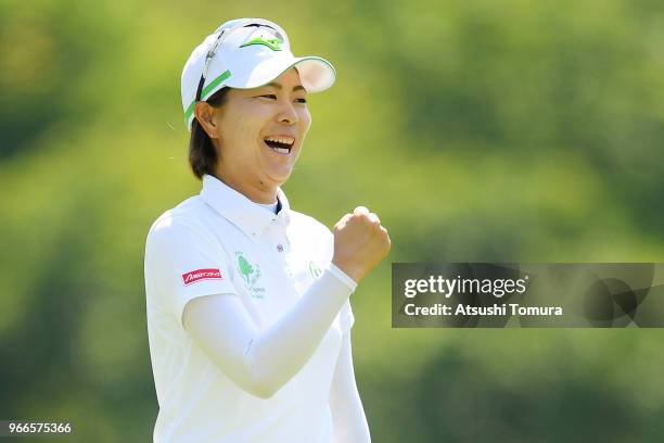 Mayu Hattori of Japan celebrates after making her eagle putt on the 18th hole during the final round of the Yonex Ladies at Yonex Country Club on...