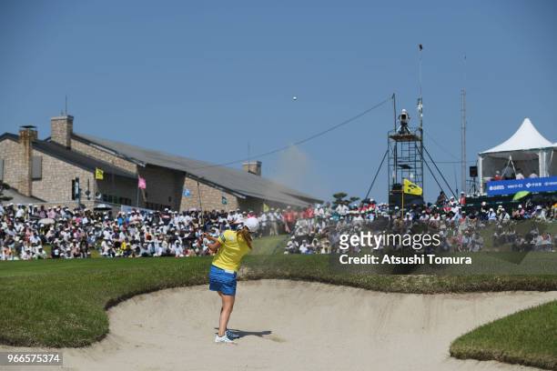 Haruka Morita of Japan hits from a bunker on the 18th hole during the final round of the Yonex Ladies at Yonex Country Club on June 3, 2018 in...