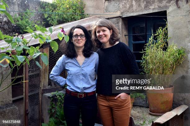 Ewenne and Marie pose in their house in Montauban, southern France on June 1, 2018. Ewenne and Marie are suing the Purpan hospital in Toulouse for...