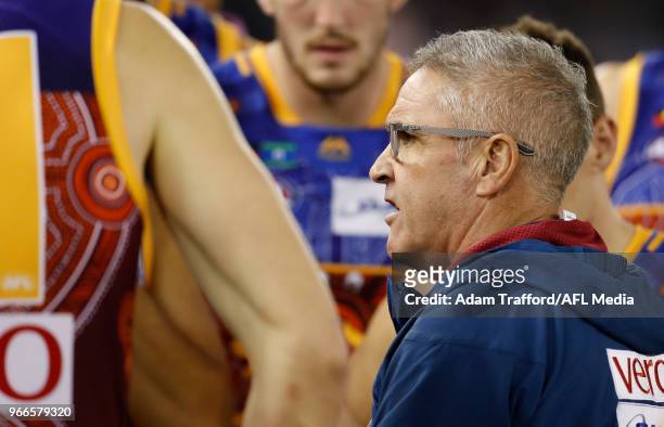 Chris Fagan, Senior Coach of the Lions addresses his players during the 2018 AFL round 11 match between the North Melbourne Kangaroos and the...