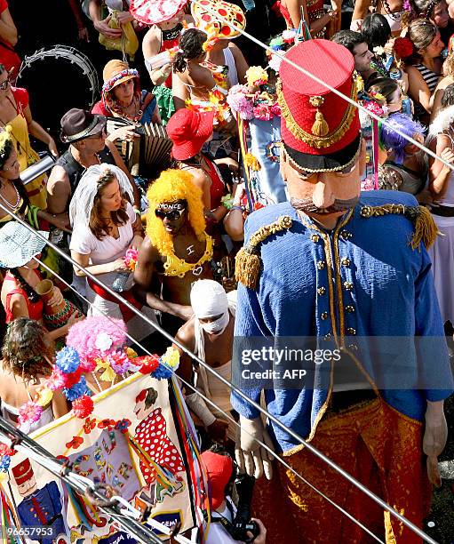 Members of the Ceu na Terra carnival street band perform along the bohemian village of Santa Teresa, during the first day of Rio de Janeiro's famous...