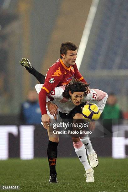 Marco Motta of AS Roma and Cavani of US Citta' di Palermo in action during the Serie A match between AS Roma and US Citta di Palermo at Stadio...