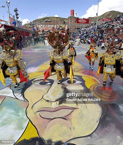 Devil-masked dancers perform in the carnival parade in Oruro, some 400 kms from La Paz, on February 13, 2010. The Carnival of Oruro is one of...