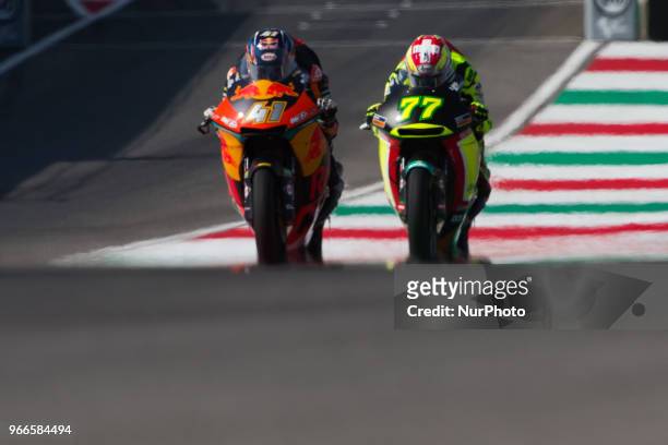 Brad Binder of Red Bull KTM Ajo and Dominique Aegerter of Kiefer Racing battle during the warm-up of the Oakley Grand Prix of Italy, at International...