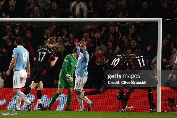 Joleon Lescott of Manchester City reacts after Ricardo Fuller of Stoke City scored an equalising goal during the FA Cup sponsored by E.ON Fifth round...
