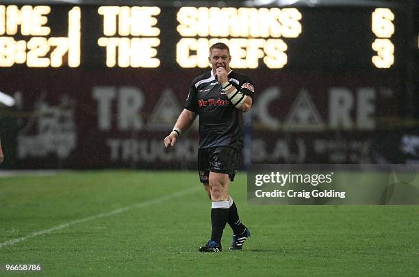 John Smit of The Sharks walks off after receiving his sin bin orders during the Super 14 match between The Sharks and Chiefs from Absa Stadium on...
