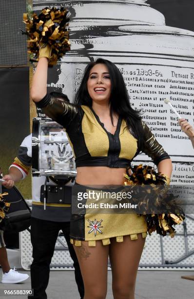 Member of the Vegas Golden Knights Golden Aces performs during a Golden Knights road game watch party for Game Three of the 2018 NHL Stanley Cup...