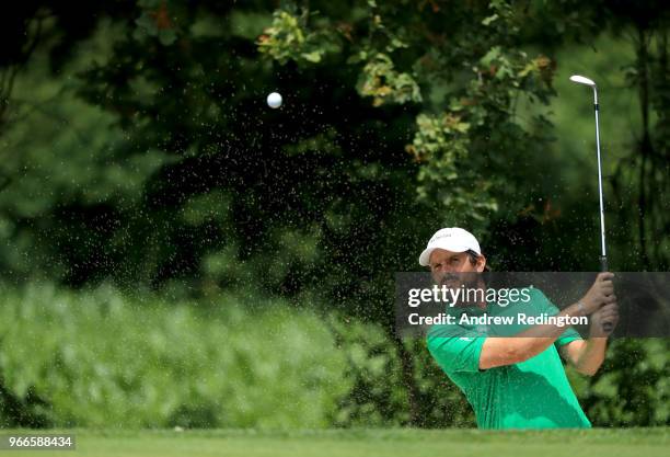 Thomas Aiken of South Africa plays a shot from a bunker on the 2nd holeduring the final round of the Italian Open at Gardagolf Country Club on June...