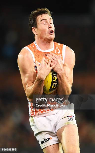 Jeremy Cameron of the Giants marks during the round 11 AFL match between the Adelaide Crows and the Greater Western Sydney Giants at Adelaide Oval on...