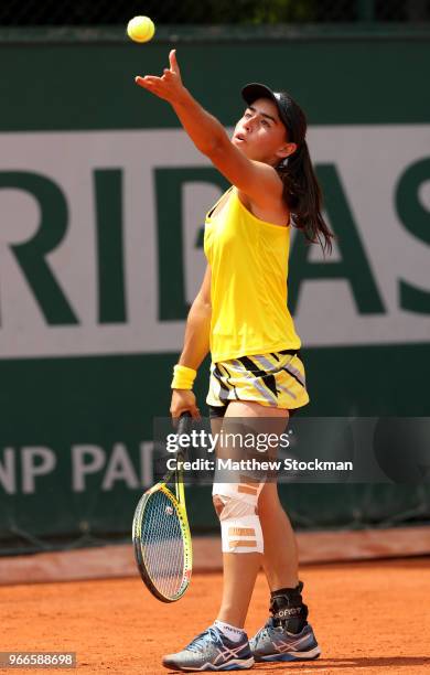 Ana Paula Melilo of Brazil in action during her girls singles first round match against Lulu Sun of Switzerland during day eight of the 2018 French...