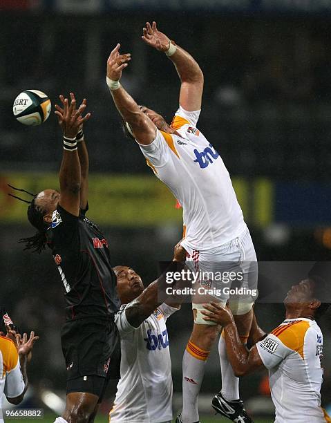 Craig Clarke of the Chiefs and Odwa Ndungane of the Sharks both miss the up and under kick during the Super 14 match between The Sharks and Chiefs...