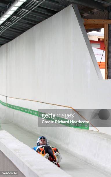 Luge training runs resume after a protective wall is installed along turn 16 of the luge course, where Georgian luger Nodar Kumaritashvili was killed...