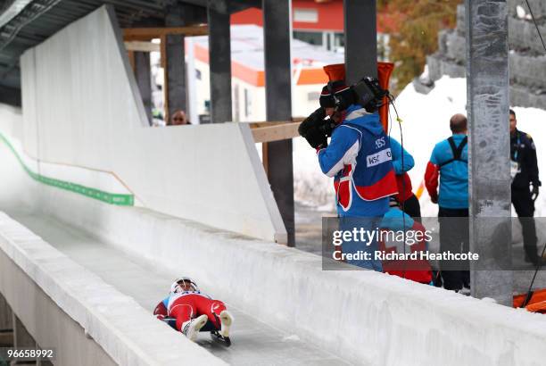 Luge training runs resume after a protective wall and padding is installed along turn 16 of the luge course, where Georgian luger Nodar...